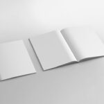Mockup of 2 A4 Magazines Placed on the Surface in Perspective