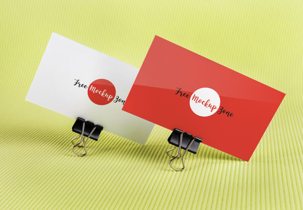 Mockup of 2 Business Cards Held by Binder Clips