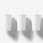 Mockup of 3 Floating Coffee Cups with Straws in the Front View