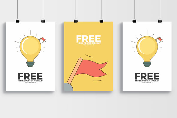 Mockup of 3 Hanging Posters on the Wall