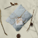 Mockup of a Card on a Wrapped Gift