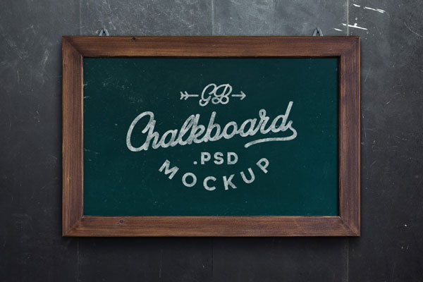 Mockup of a Chalkboard with Wooden Frame on a Wall