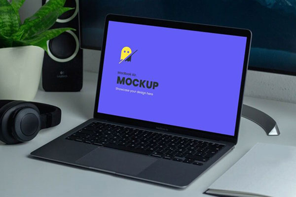 Mockup of a MacBook Air on a Work Desk