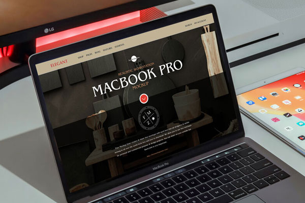 Mockup of a MacBook Pro Placed in a Realistic Workspace