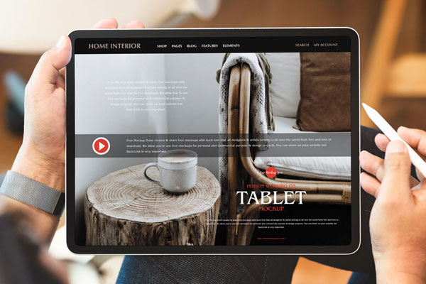 Mockup of a Person Using Tablet