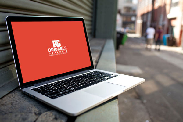 Mockup of a Perspective View Laptop in Street