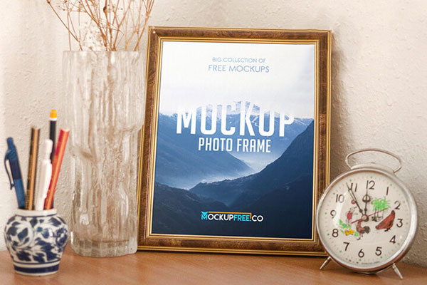 Mockup of a Photo Frame Decorated with a Clock and Vases