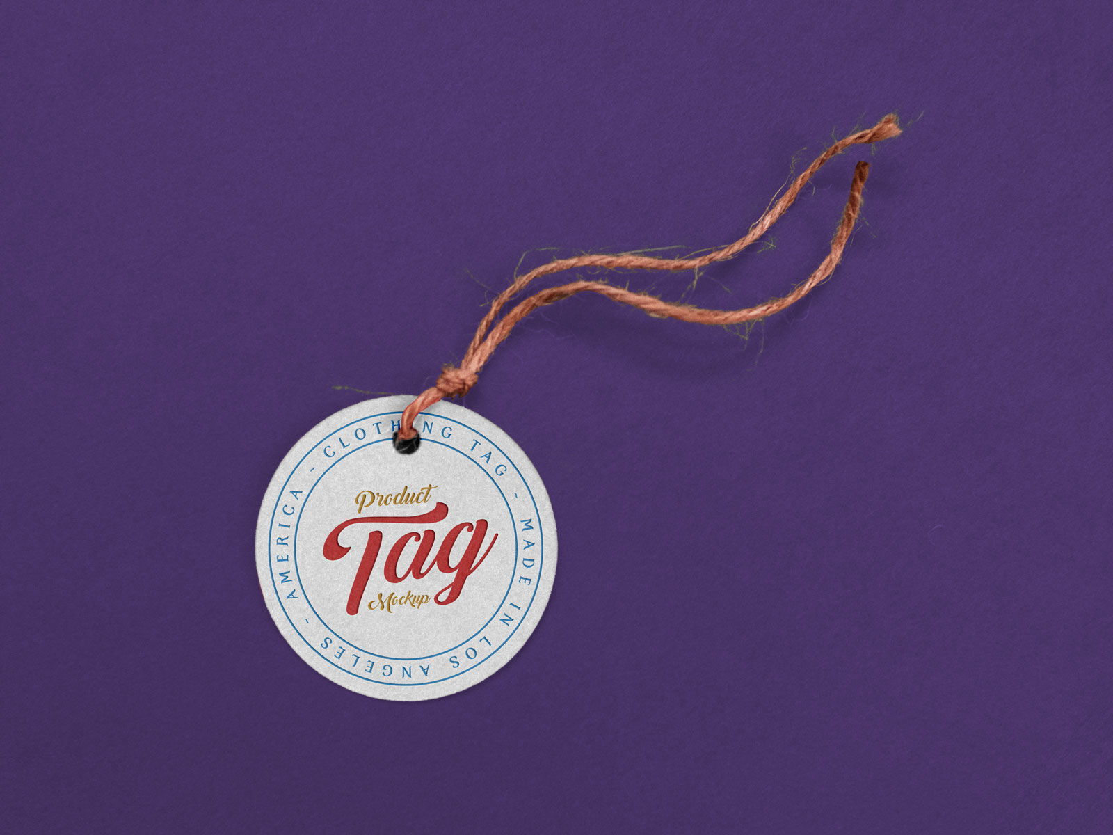 Mockup of a Round Product Tag With a String FREE PSD