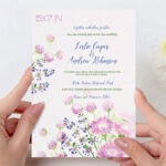 Mockup of a Wedding Card in Hand