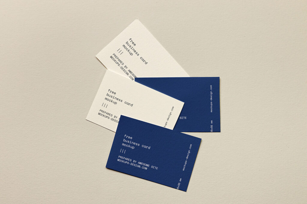Mockup of Business Cards Lying on Paper