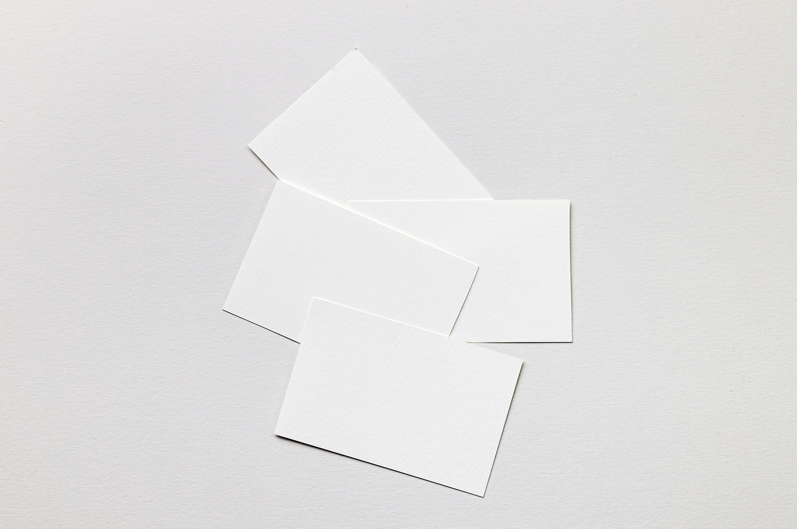 Mockup of Business Cards Lying On Paper FREE PSD