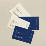 Mockup of Business Cards Lying on Paper