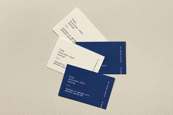Mockup of Business Cards Lying on Paper