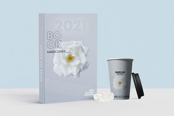 Mockup of Hardcover Book Along with Paper Coffee Cup