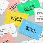 Mockup of Realistic Business Cards Scattered on the Screen