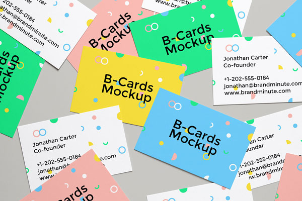 Mockup of Realistic Business Cards Scattered on the Screen