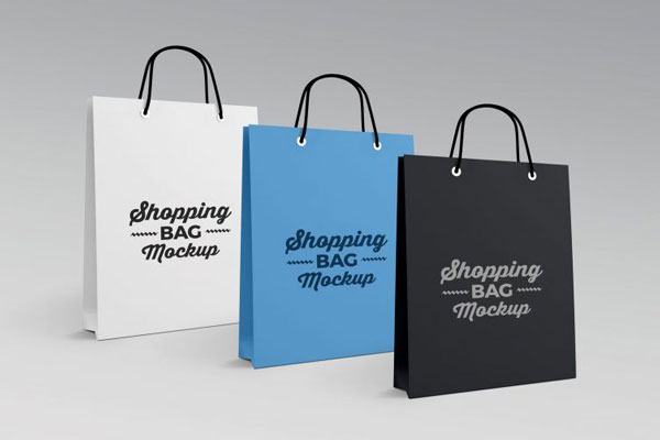 Mockup of Three Paper Shopping Bags