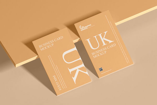 Mockup of Two Business Cards Laid on a Board