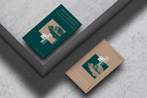 Mockup of Two Floating Business Cards at the 3\4 Angle View