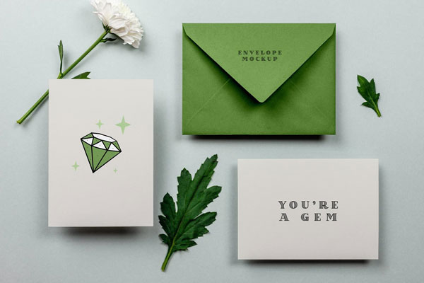 Mockup of Two Greeting Cards and an Envelope with Flower