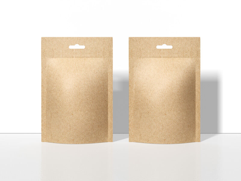 Mockup of Two Kraft Packets Standing in the Front View