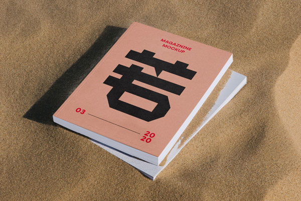 Mockup of Two Thick Magazines in Sand