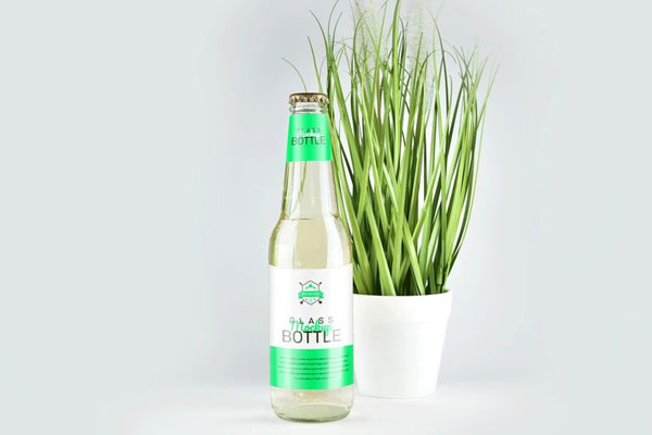 Mockup Showcasing 330ml Clear Glass Bottle with Plant Pot