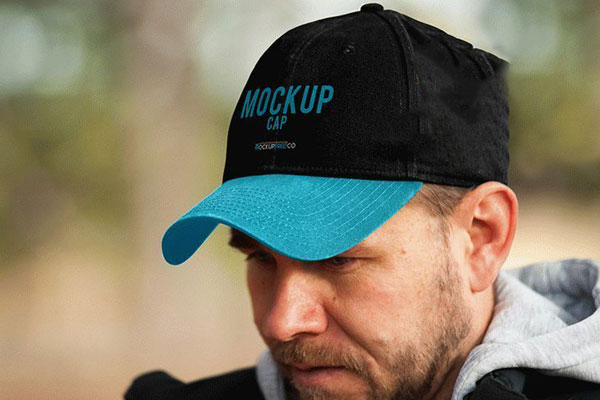 Mockup Showcasing a Man Model Wearing a Cap