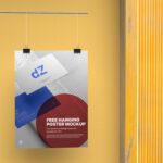 Mockup Showcasing a Vertical Poster Hanging with Paper Clips