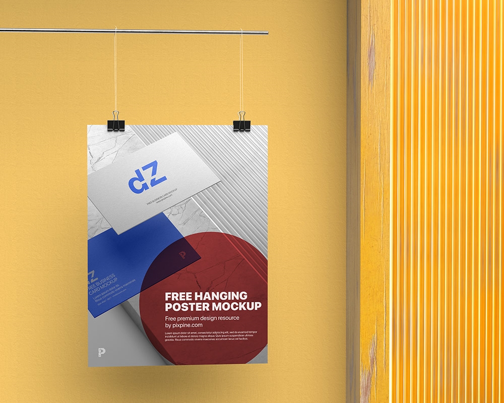 Mockup Showcasing a Vertical Poster Hanging with Paper Clips