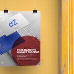 Mockup Showcasing a Vertical Poster Hanging with Paper Clips