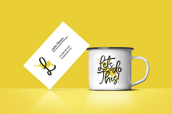 Mockup Showcasing Business Card Laid Against Enamel Mug