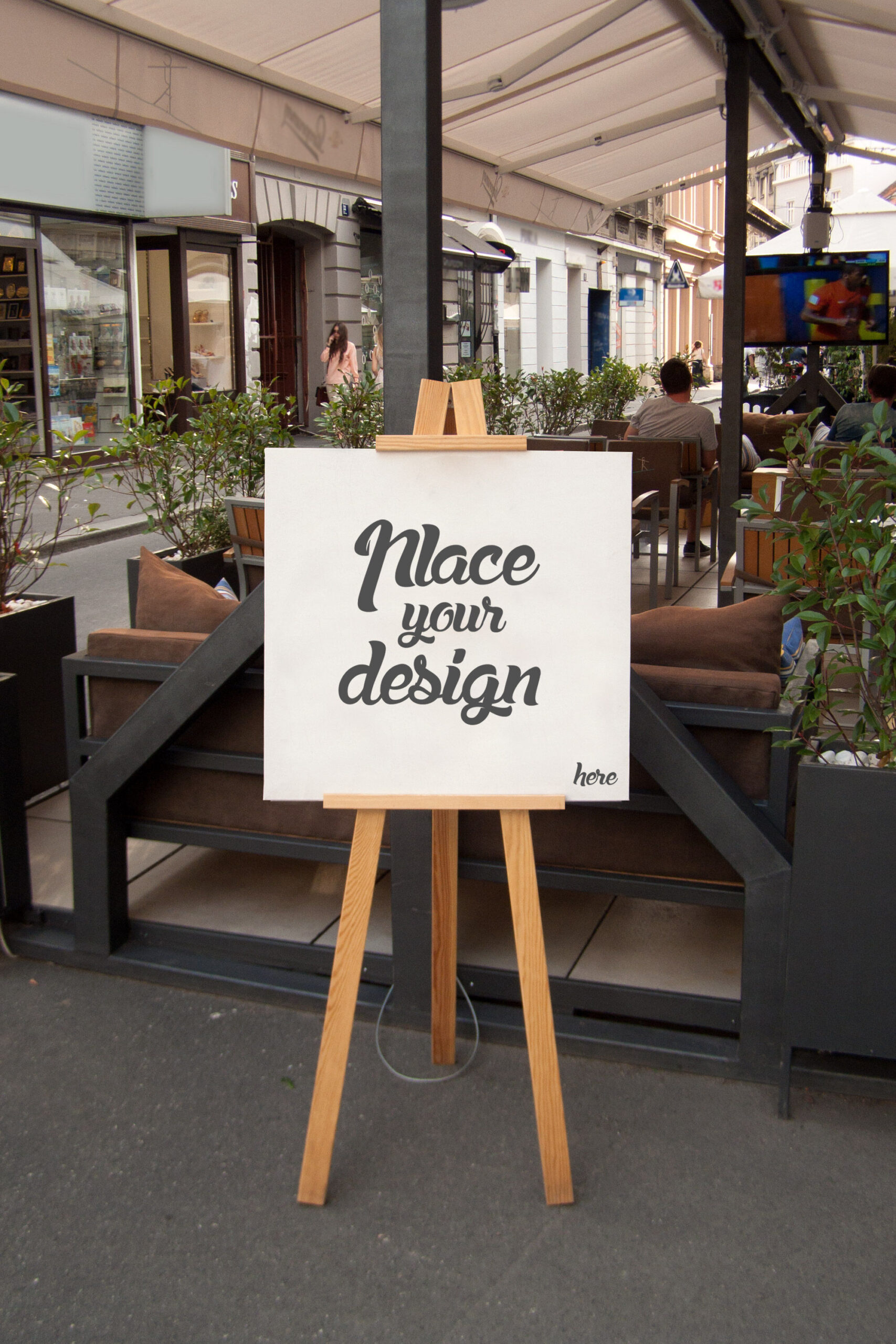 Mockup Showcasing Easel Holding a Square Frame on Outdoor Environment FREE PSD