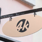 Mockup Showcasing Elliptical Shop Signboard