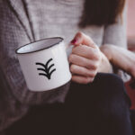 Mockup Showcasing Girl Holding Metal Mug