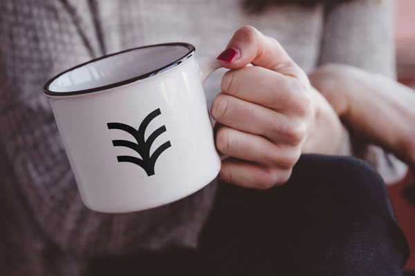 Mockup Showcasing Girl Holding Metal Mug
