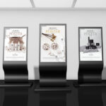 Mockup Showcasing Three Modern Black Stand Poster