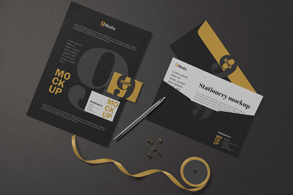 Mockup Showcasing Top view of Stationery Branding Designs