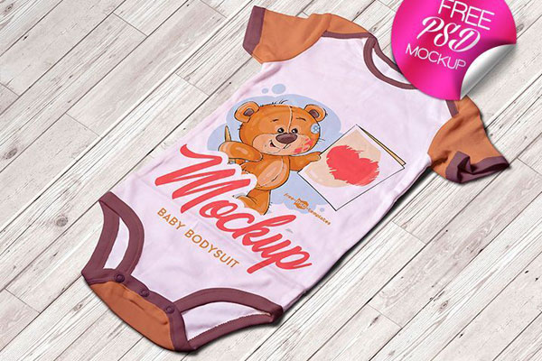 Mockup Showing a Baby Bodysuit on a Wooden Floor