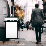 Mockup Showing a Metal Stand Sign on a Sidewalk