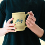 Mockup Showing a Woman Holding a Mug