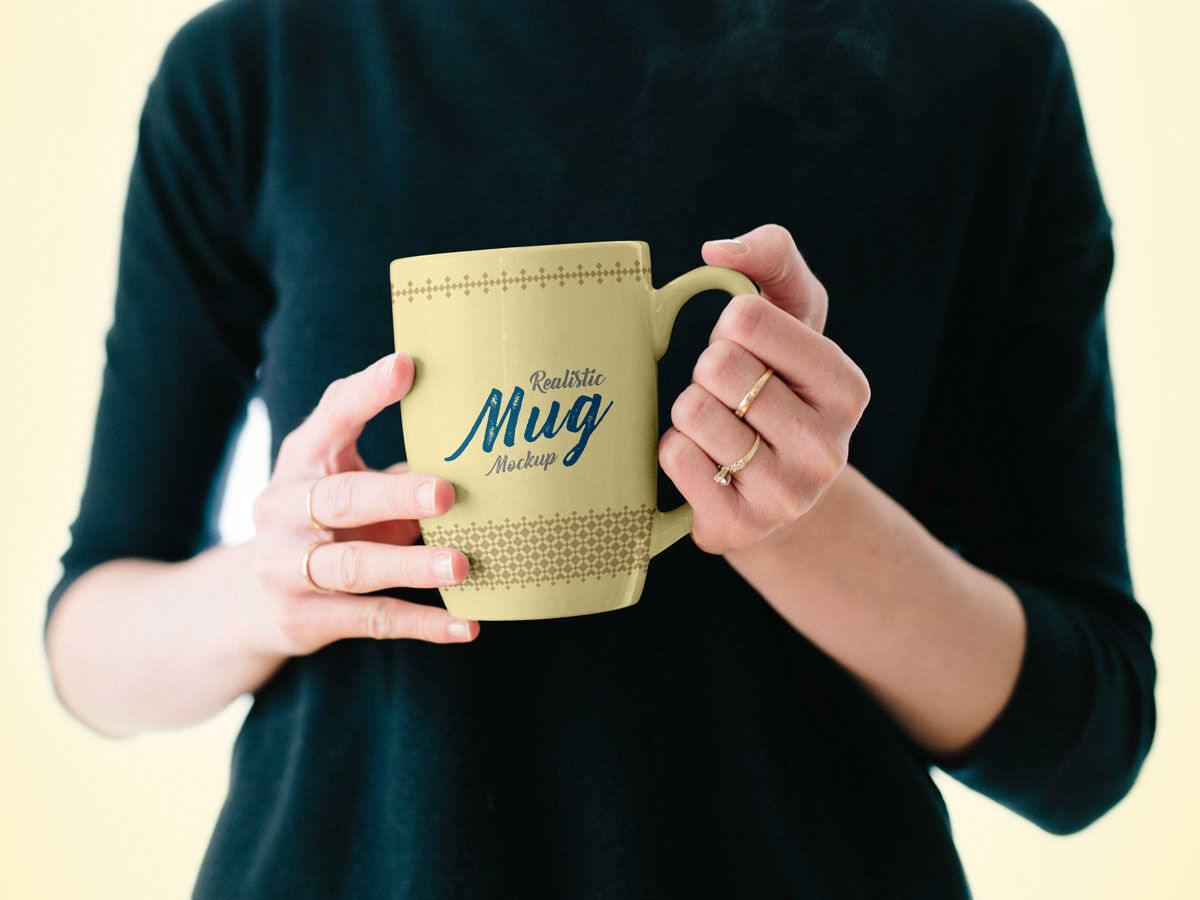 Mockup Showing a Woman Holding a Mug FREE PSD