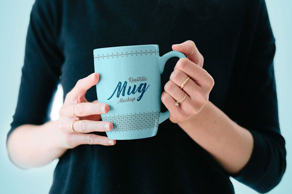 Mockup Showing a Woman Holding a Mug