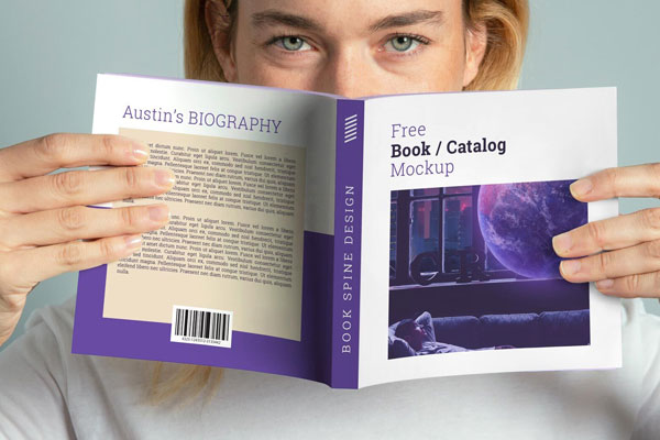 Mockup Showing a Woman Holding a Square Paperback