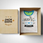 Mockup Showing an Opened Box Containing Folded T-Shirt