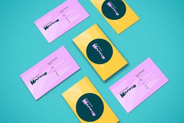 Mockup Showing Overhead View of Six Scattered Business Cards