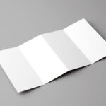 Mockup Showing Side View of Opened Four-fold Brochure