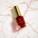 Mockup Showing Square Nail Polish Bottle with Cylindrical Cap
