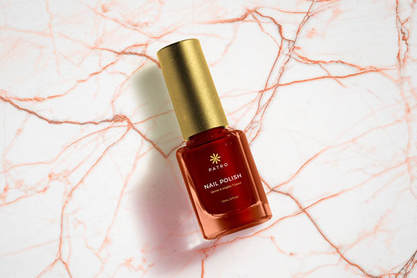 Mockup Showing Square Nail Polish Bottle with Cylindrical Cap