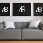 Mockup Showing Three Posters in Living Room Above a Sofa